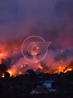 La tragedia del fuoco in Grecia. In quell’abbraccio, tra quelle anime e Dio La tragedia del fuoco in Grecia. In quell’abbraccio, tra quelle anime e Dio